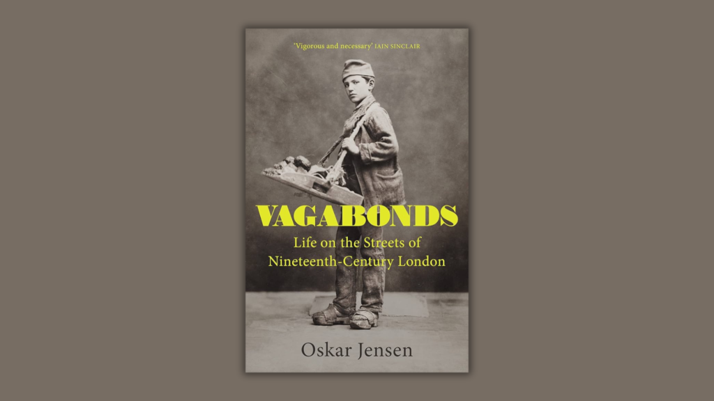 Book cover of 'Vagabonds' by Oskar Jensen, featuring a Victorian street boy holding a tray, symbolizing life on 19th-century London streets.